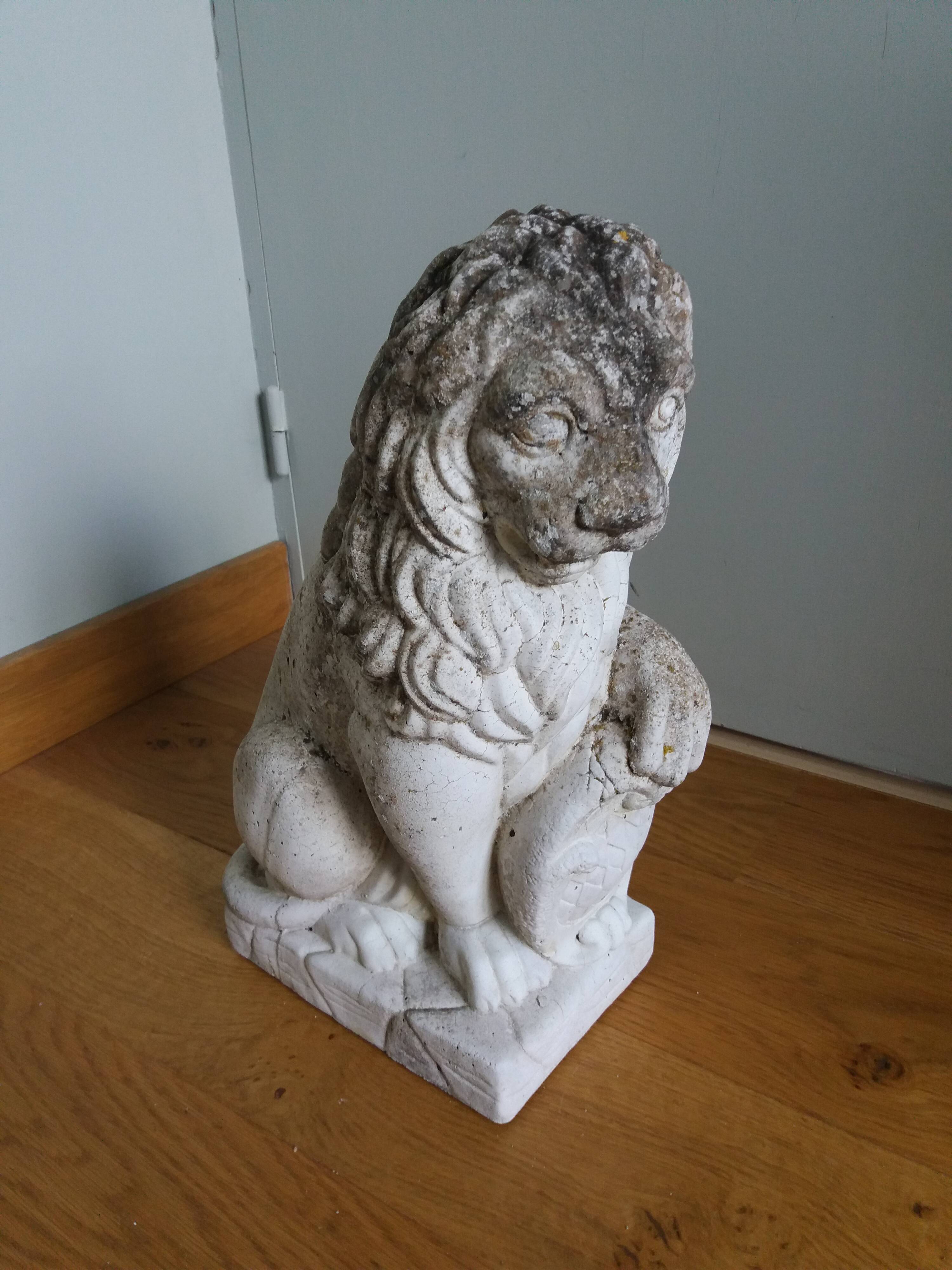 Lion garden statue in reconstituted stone