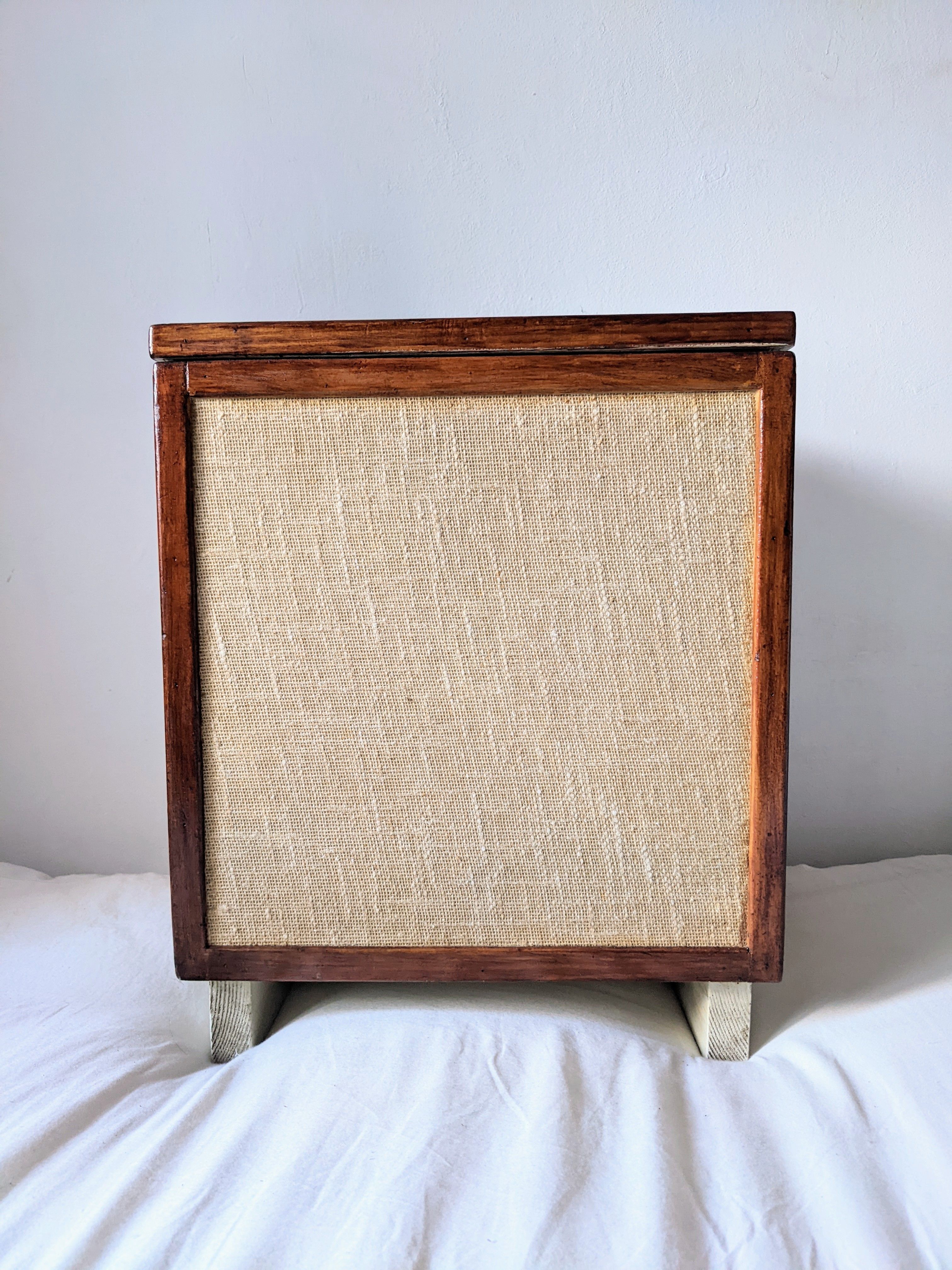 Burlap chest and varnished wood