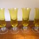 Large transparent yellow champagne flutes