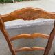 2 dining chairs with carved solid wood and rush seats in Louis XV shell style.