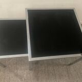 Pair of nesting tables in chromed metal and glass