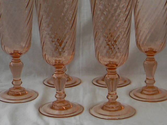 Set of 6 luminarc rosaline glass champagne flutes.
