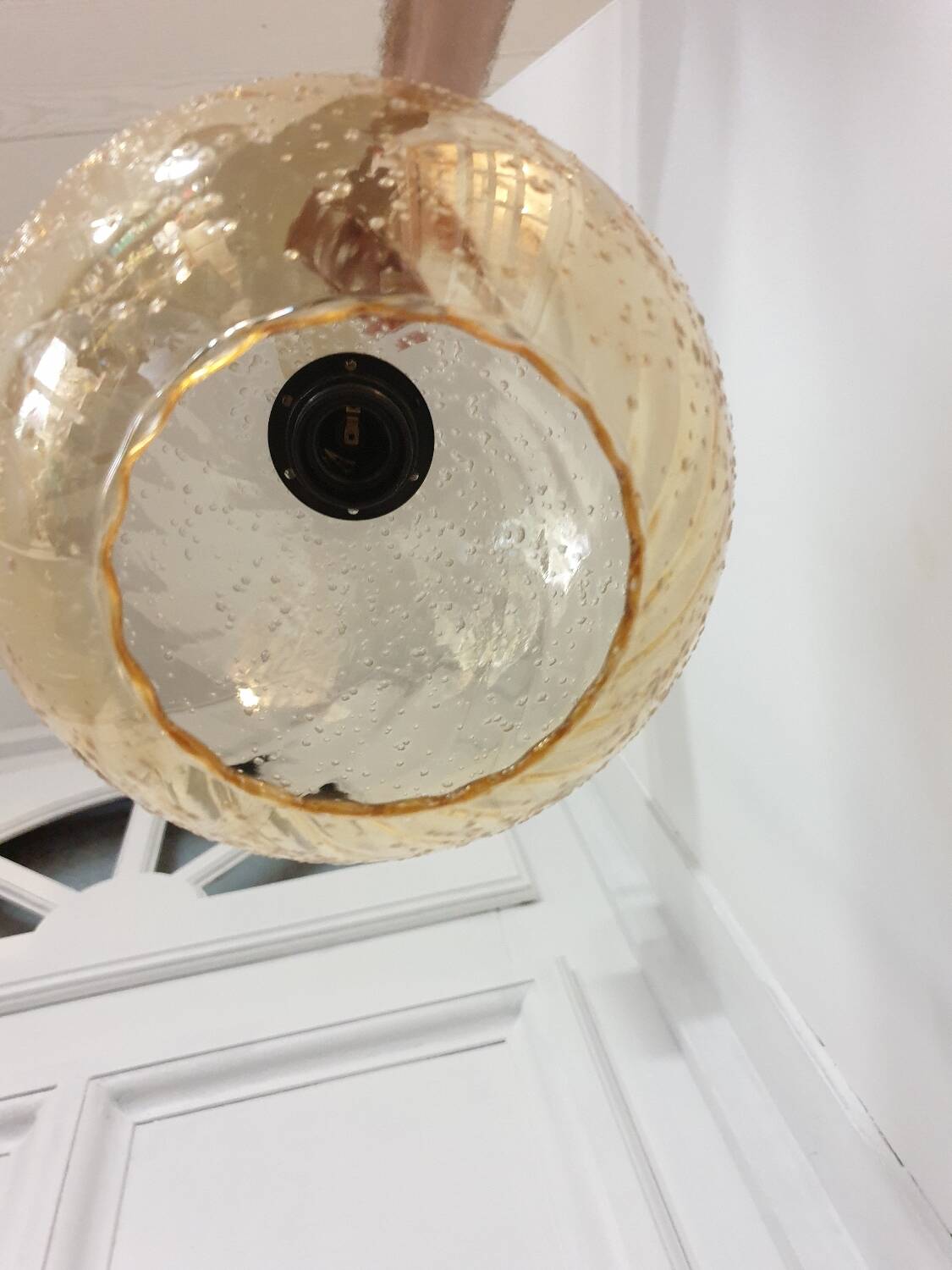 Vintage globe pendant in amber bubble glass