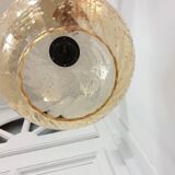 Vintage globe pendant in amber bubble glass