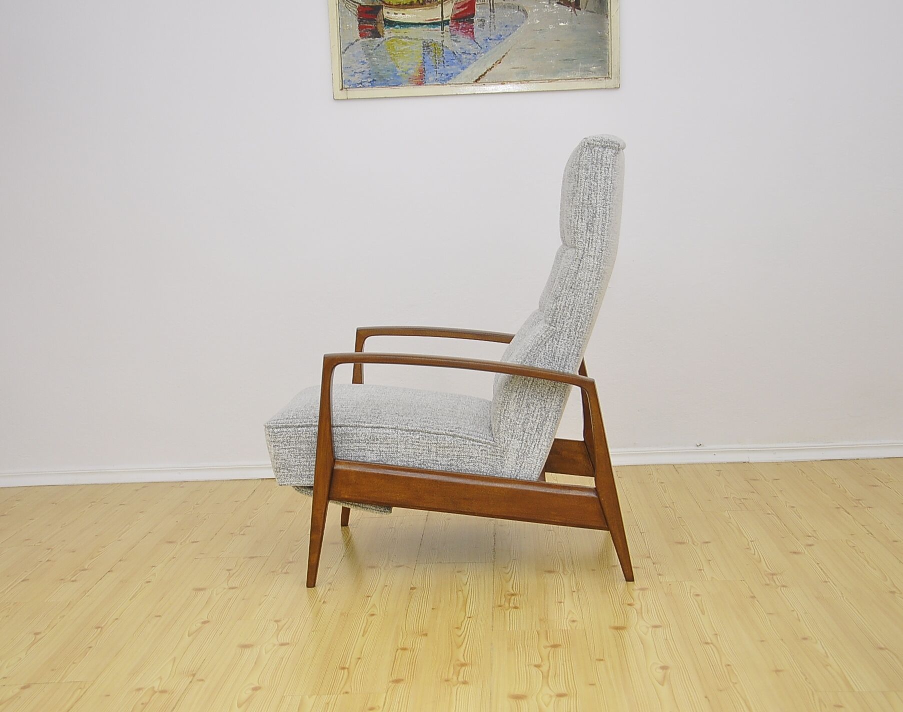 Mid-century armchair with folding footrest, 1960s