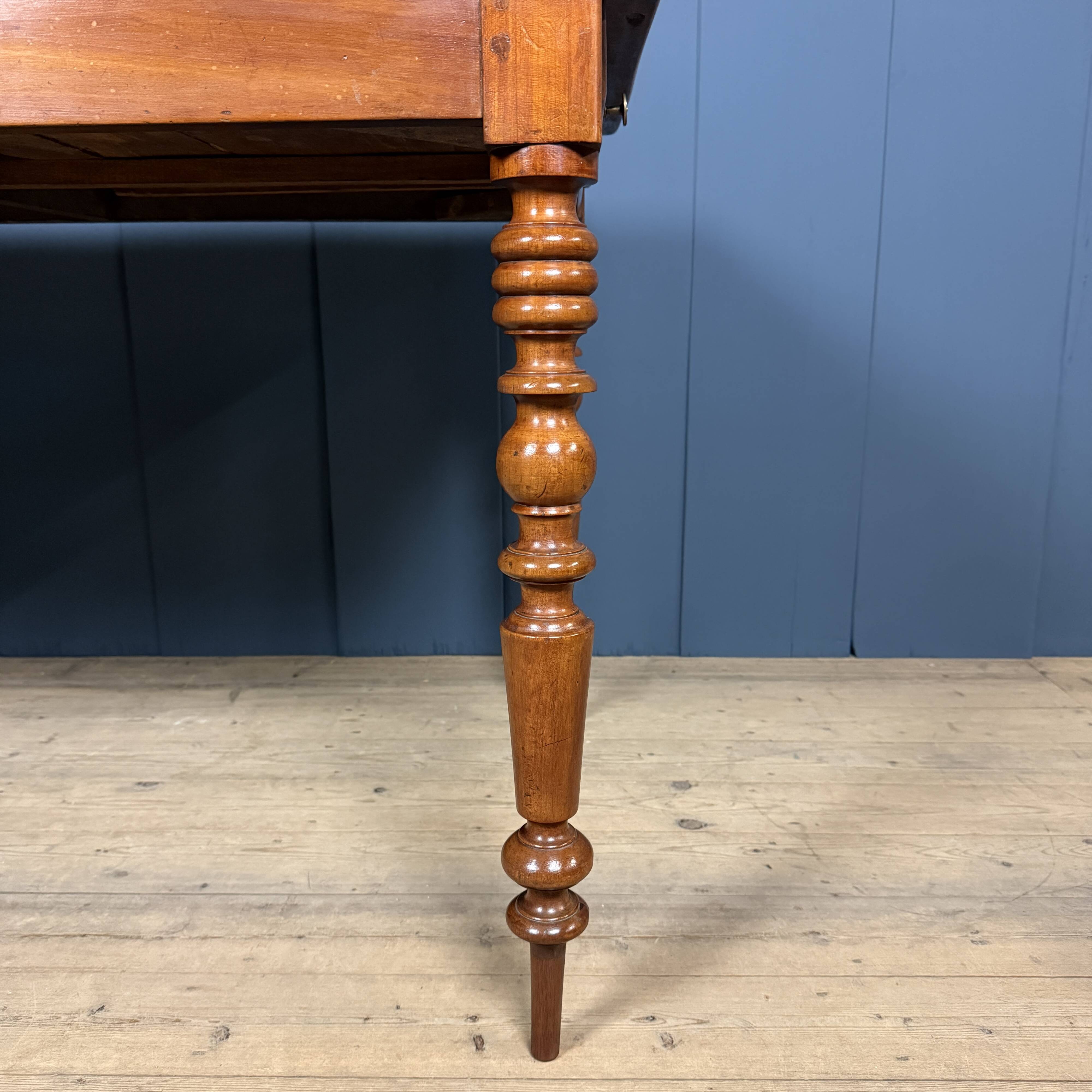 Antique cherry wood dining table from France.