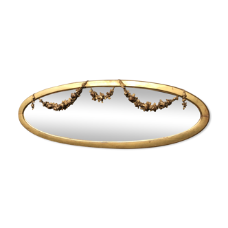 Golden oval mirror with gold leaf 106 x 38 cm