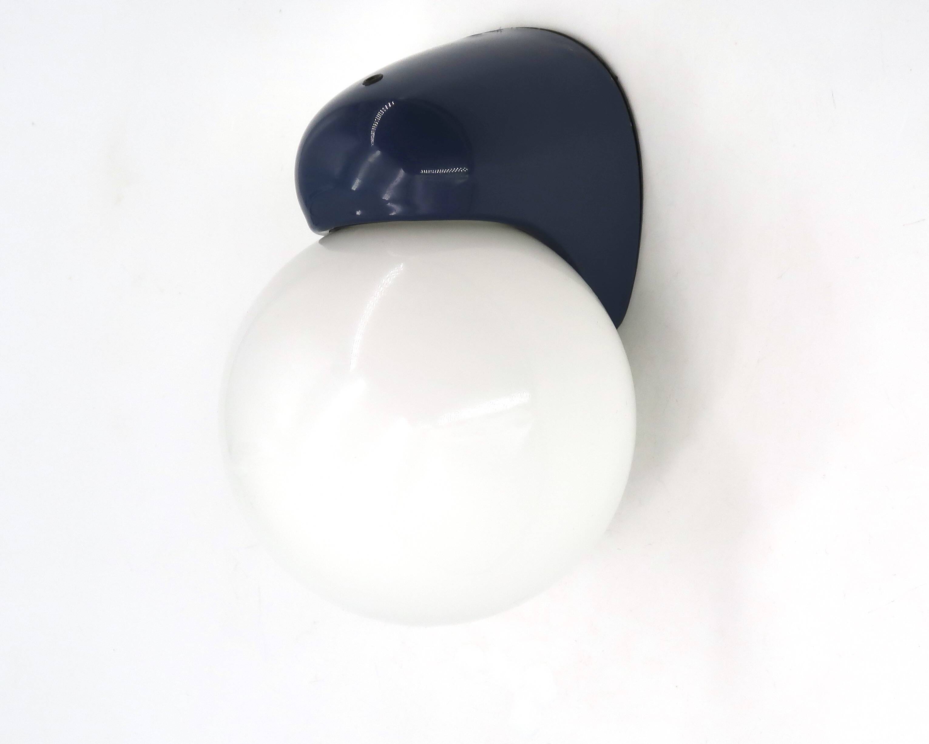 Tissot wall light in dark blue with a white opaque glass globe