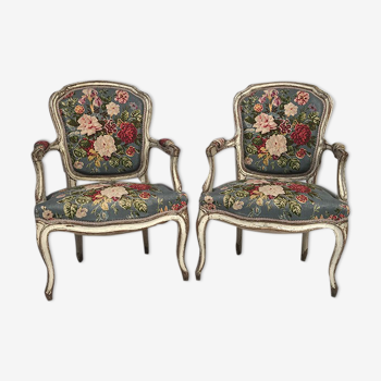 Pair of Louis XV style convertible armchairs, white lacquered wood