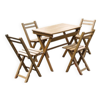 Bistro table and 4 folding slatted wooden chairs from the Grand Café de Paris
