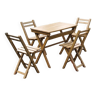 Table de bistrot et 4 chaises pliantes en bois à lattes du Grand Café de Paris
