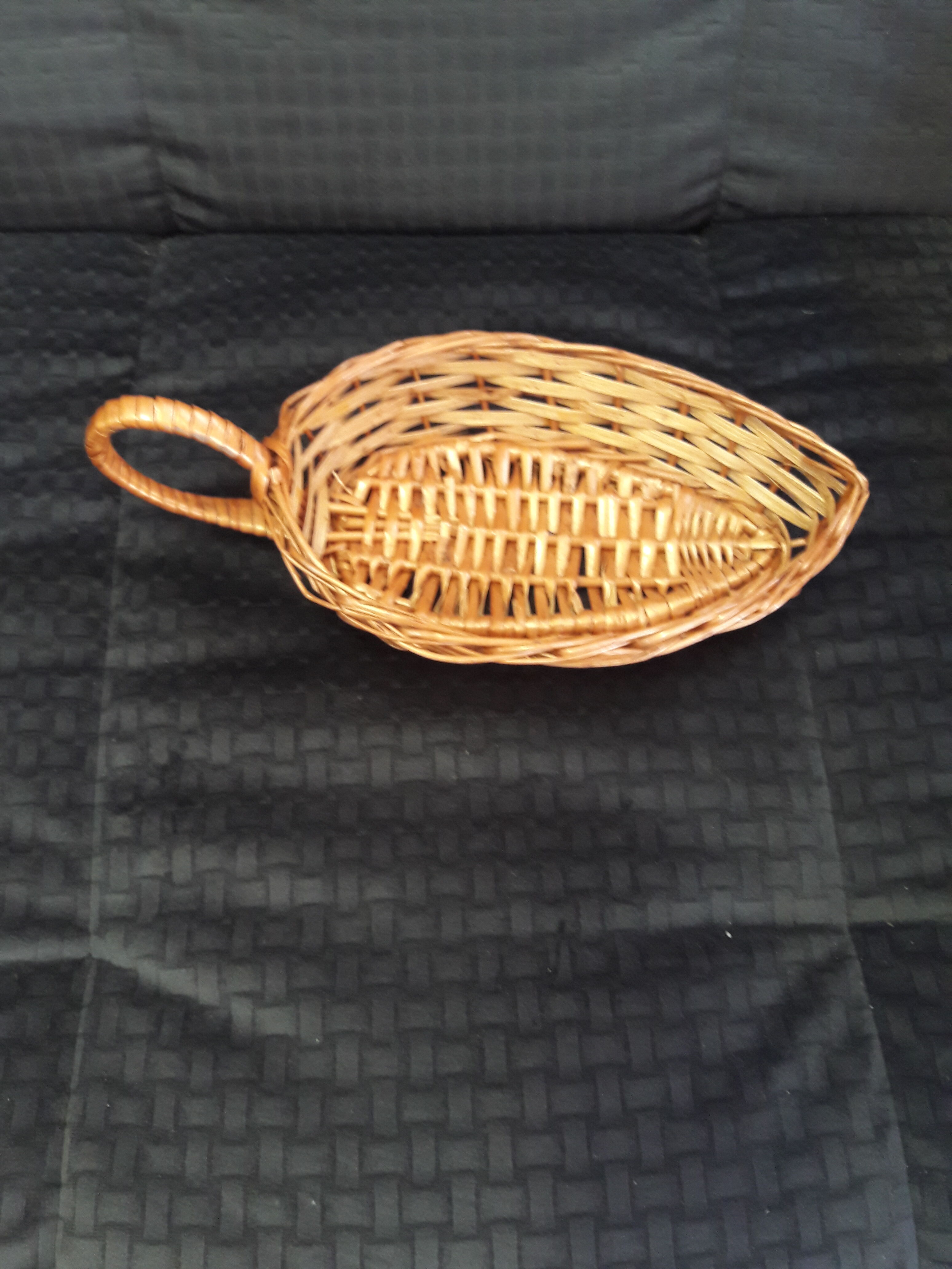 Small tray has rattan handle