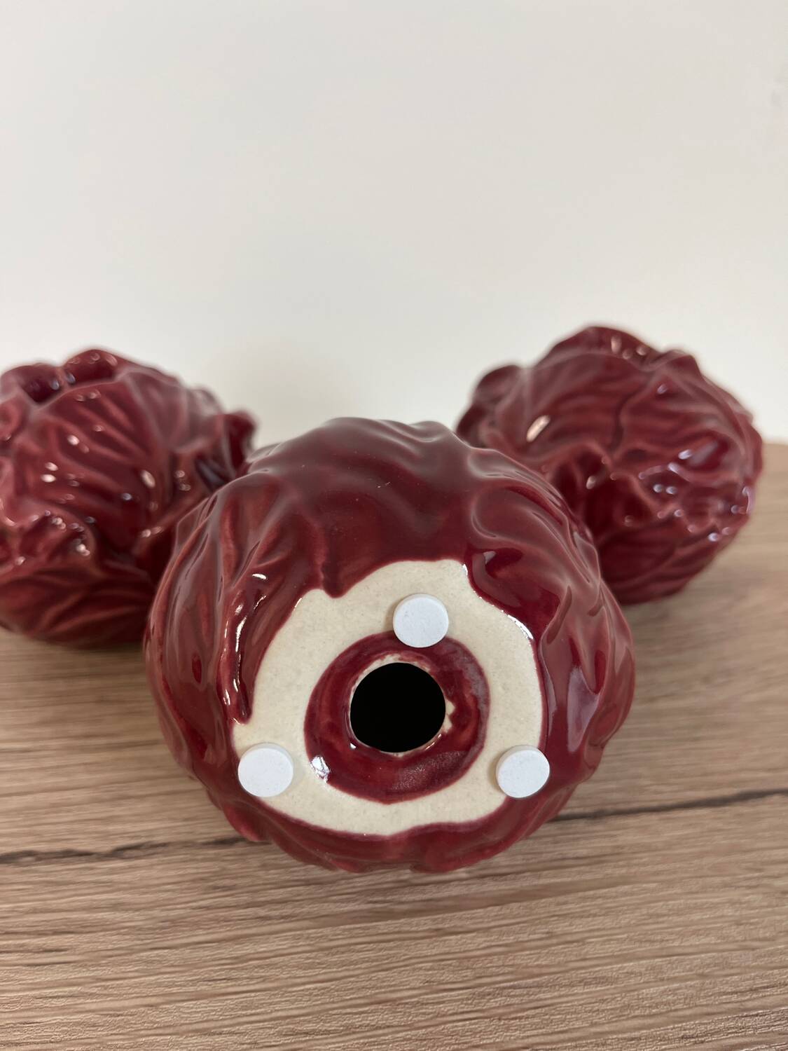 Cabbage-shaped slipware candlesticks, set of 3