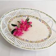 Oval dish in openwork earthenware from Sarreguemines, blue ribbon and fruit
