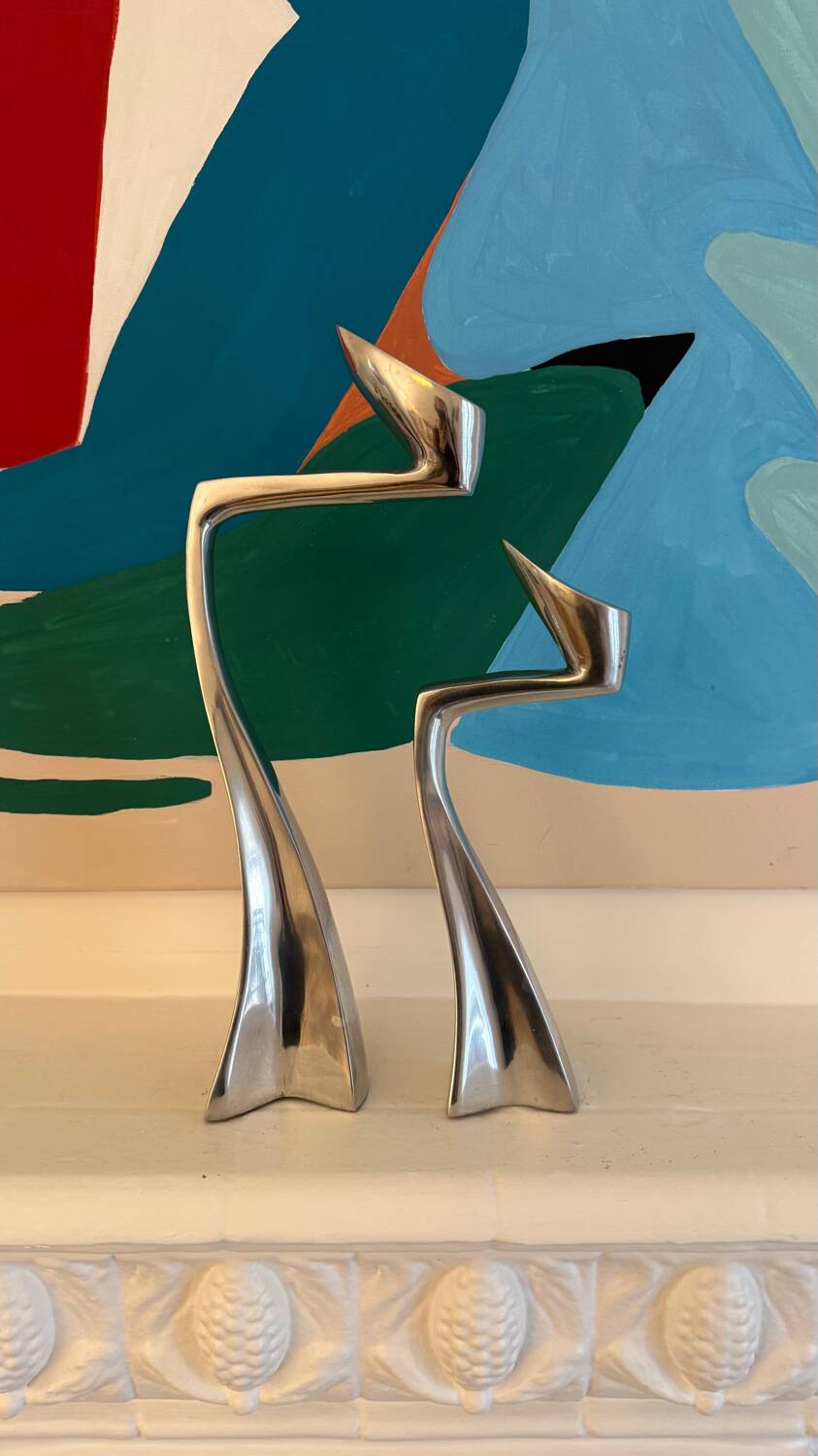 Set of 2 Swann candle holders by Matthew Hilton