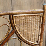 Asymmetrical rattan armchair
