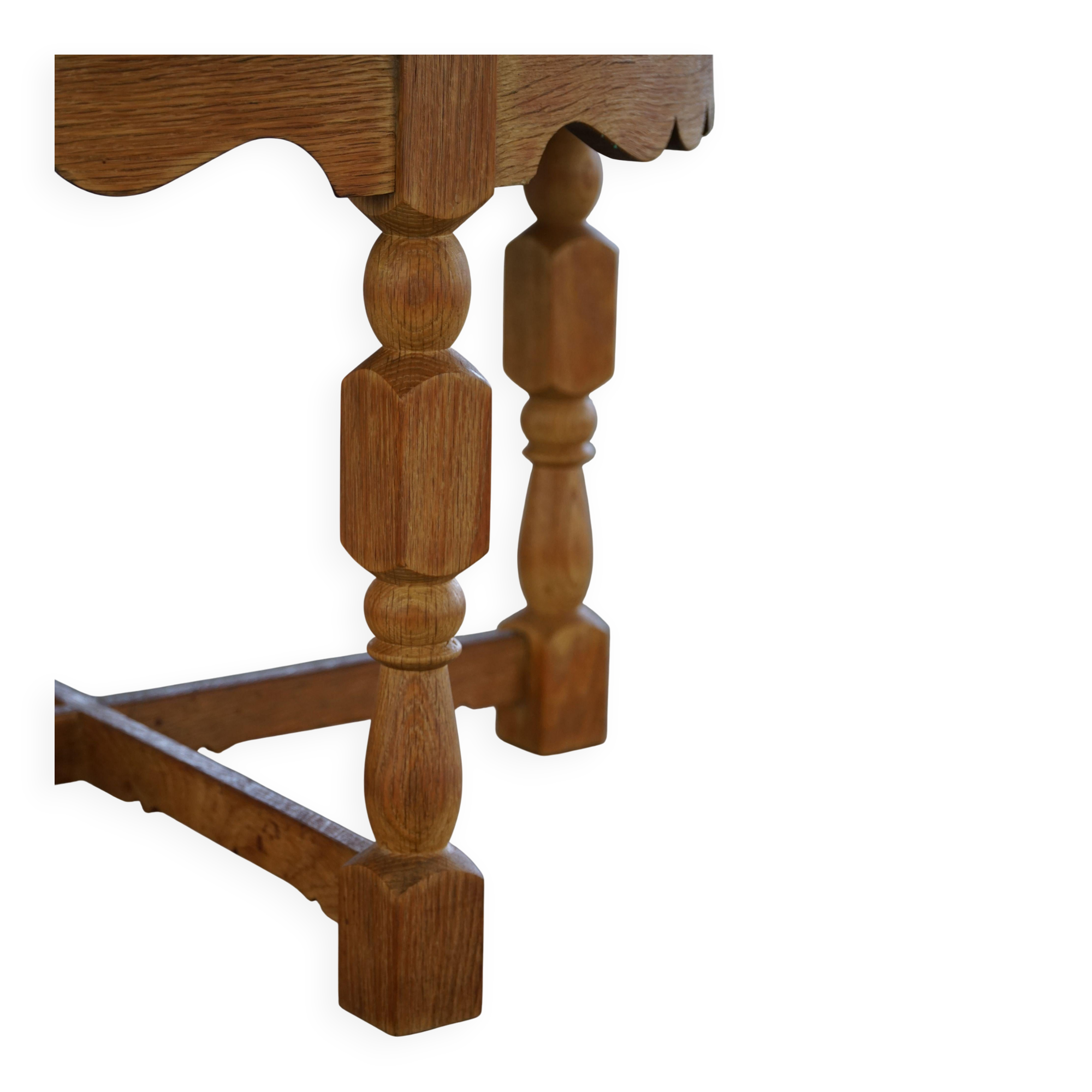 Mid-century Danish round side table in solid oak, Henning Kjærnulf, 1960s.