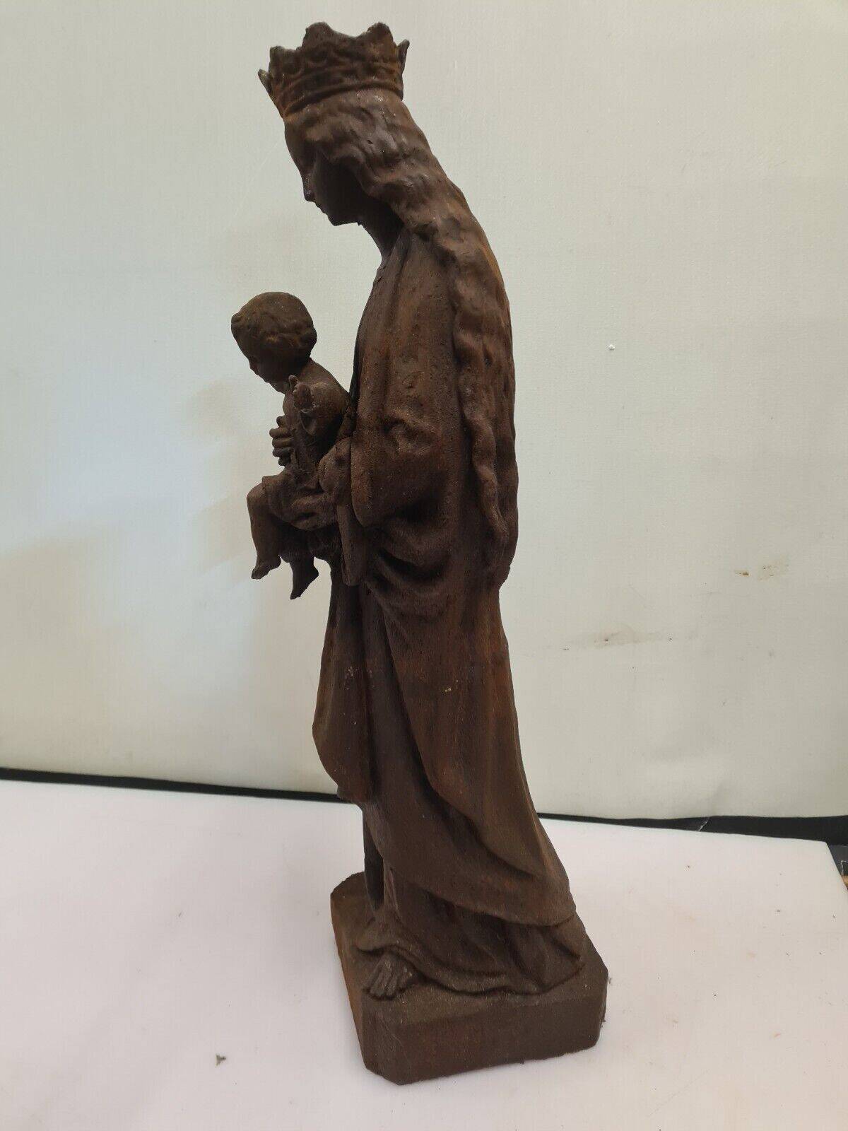statue of the holy virgin in cast iron