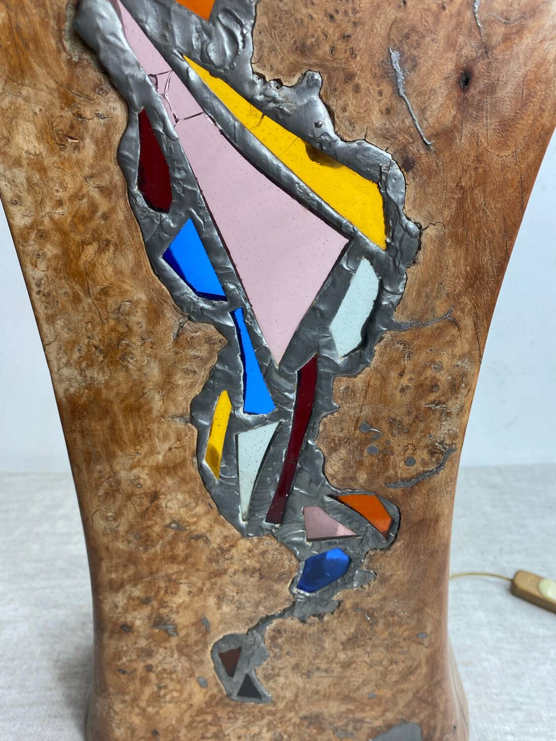 Carved wooden lamp and stained glass