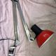 Red architect lamp patented Finland