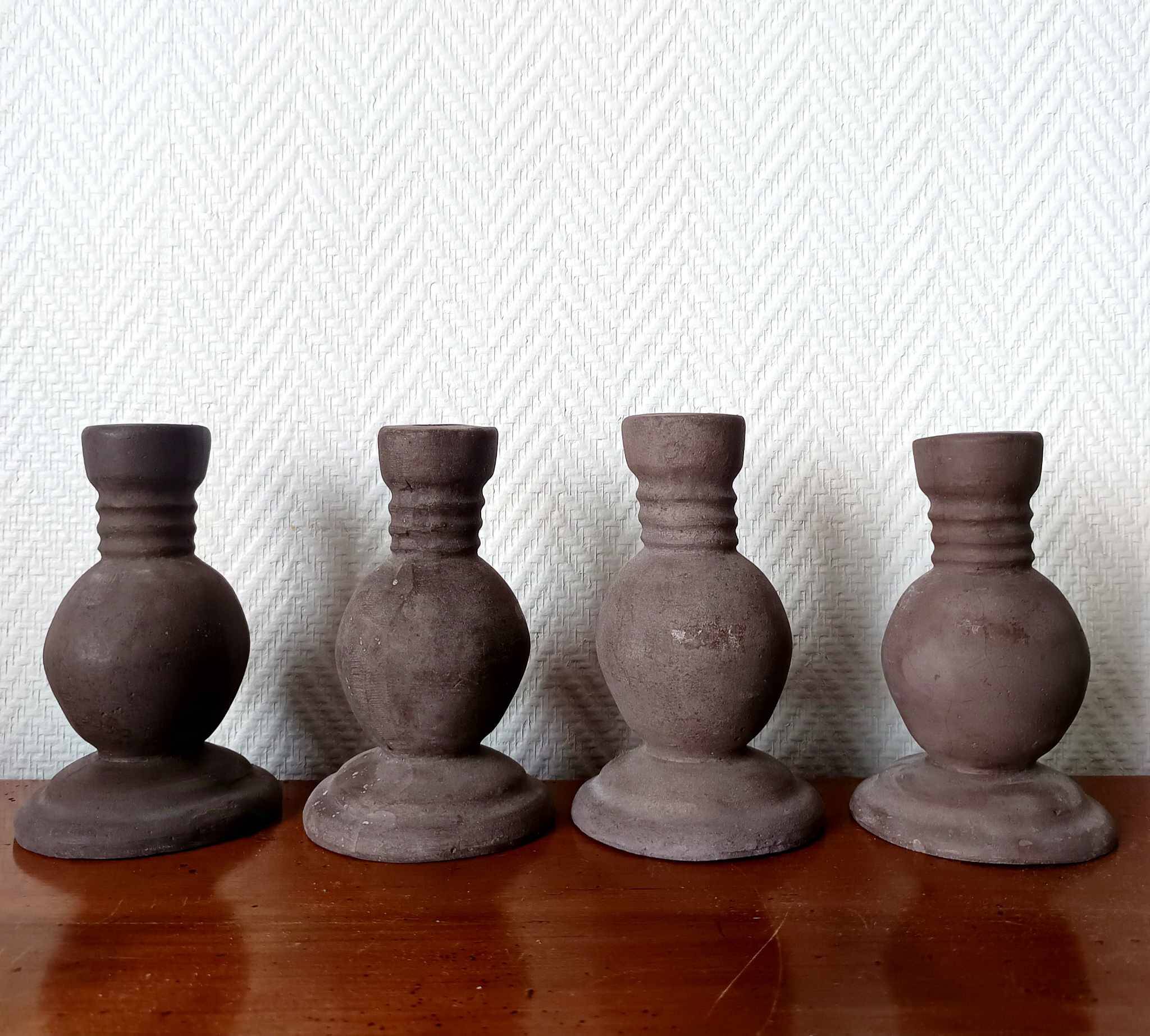 Four vintage handcrafted candle holders