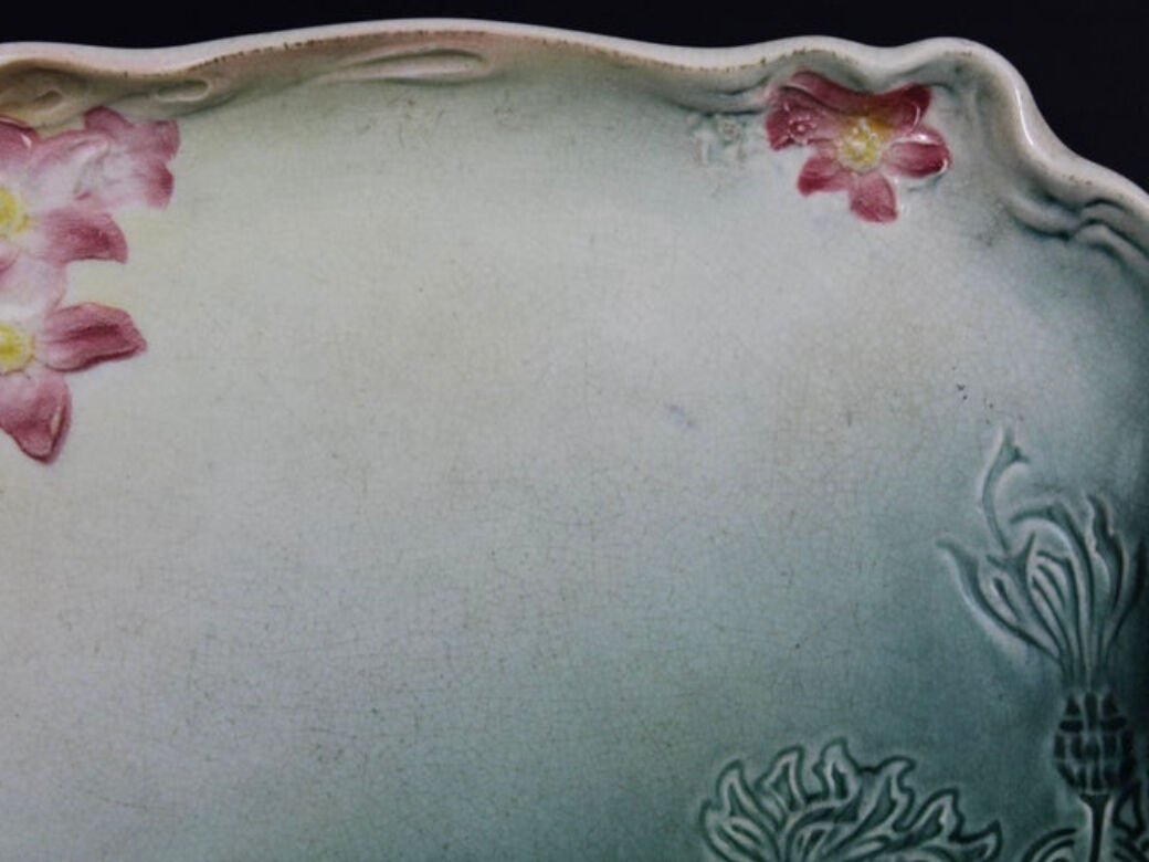 Art Nouveau plate in earthenware decorated with green and pink flowers 1900