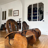 Pair of Art Deco armchairs in wood and cane.