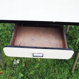 Old extendable table in yellow formica