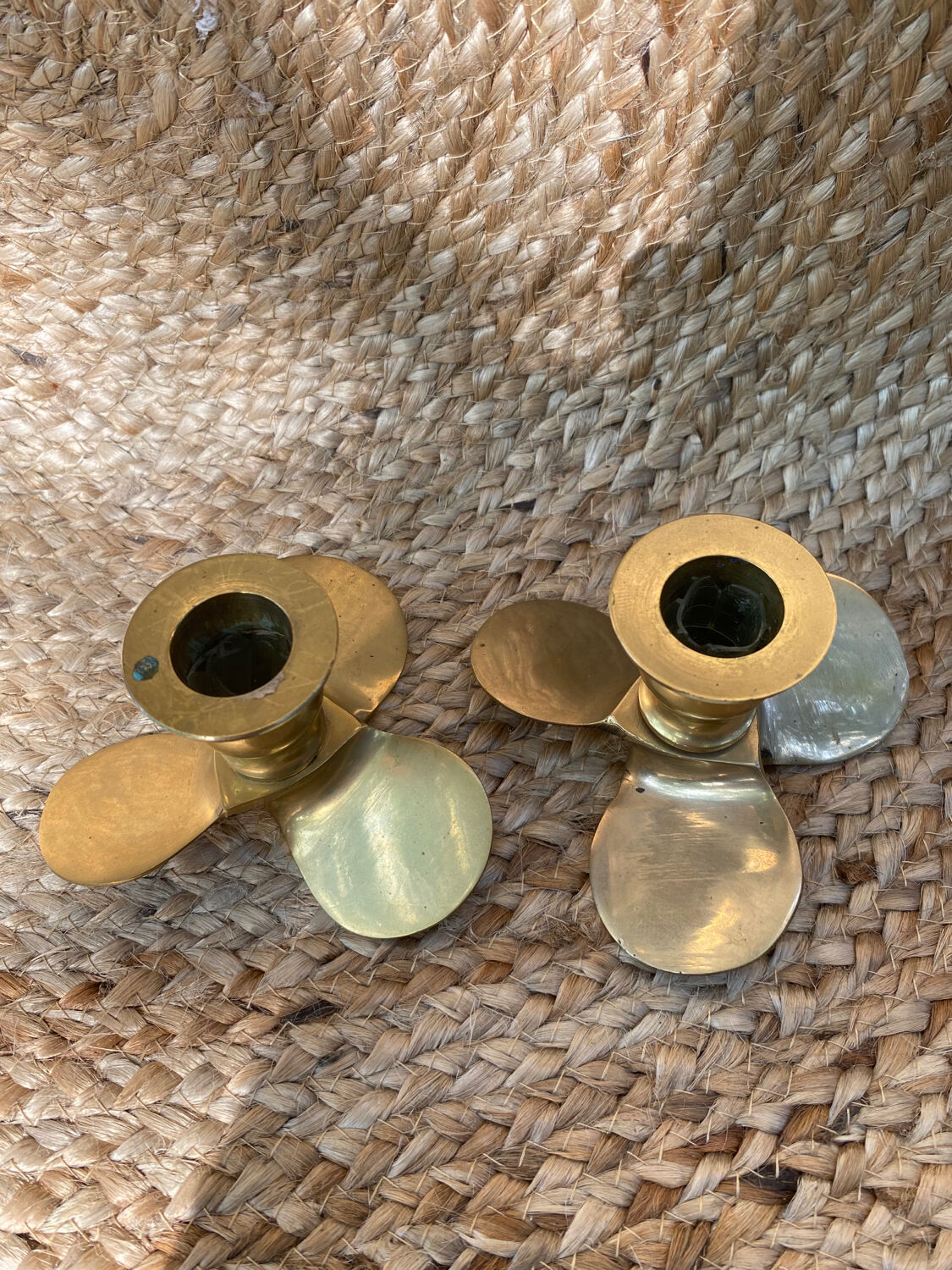 Pair of brass candle holders, helix shape