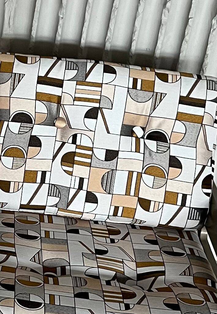 Vintage lounge chairs – newly upholstered in geometric fabric