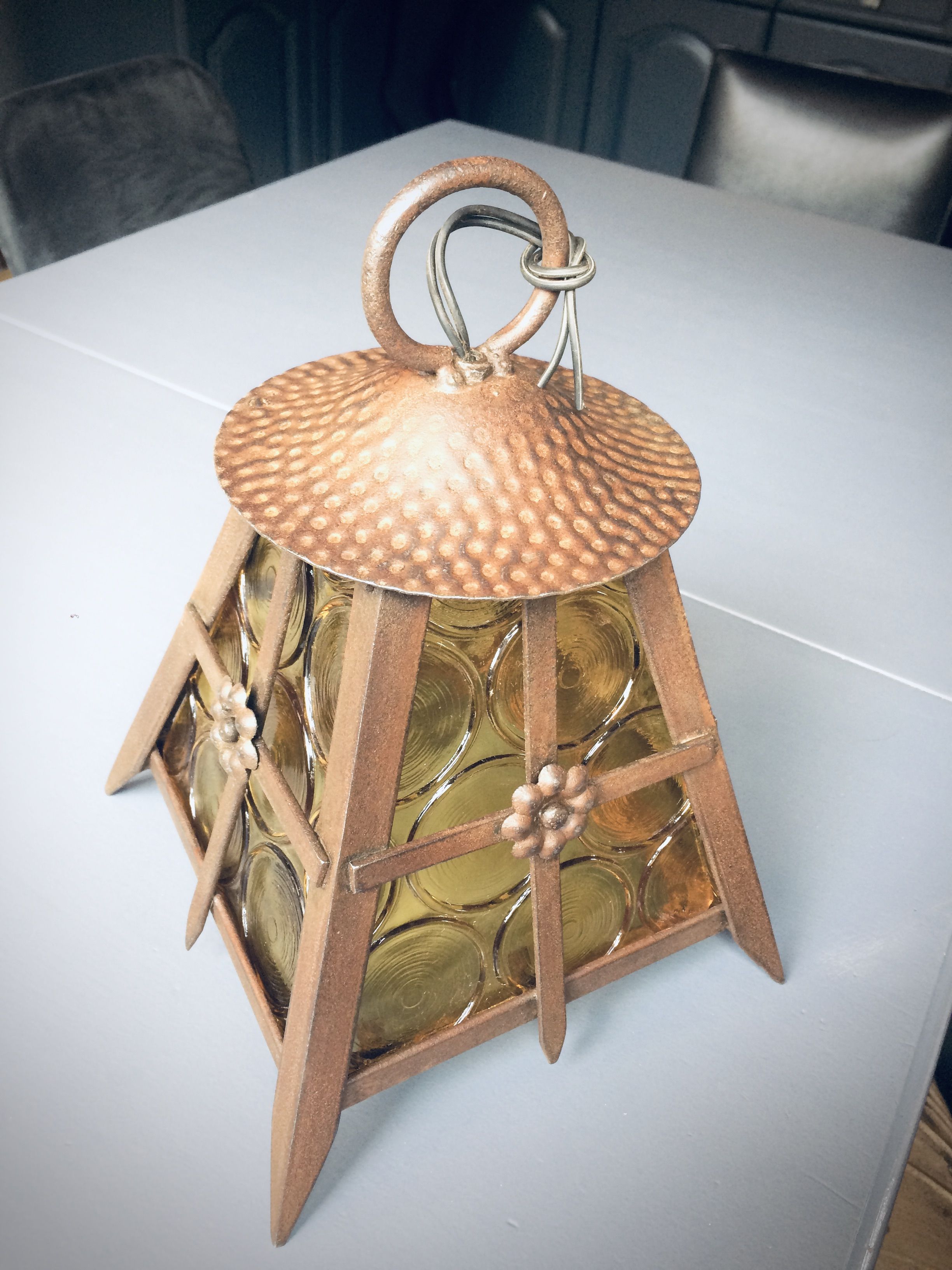 Old solid steel hanging and round-ornamented yellow glazing