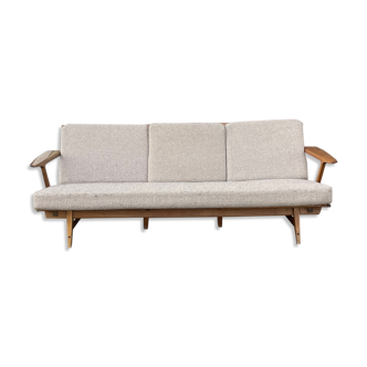 Scandinavian sofa in wood and fabric from the 60s with z-armrests