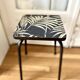Antique stool in restyled formica