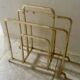 Designer brass magazine rack