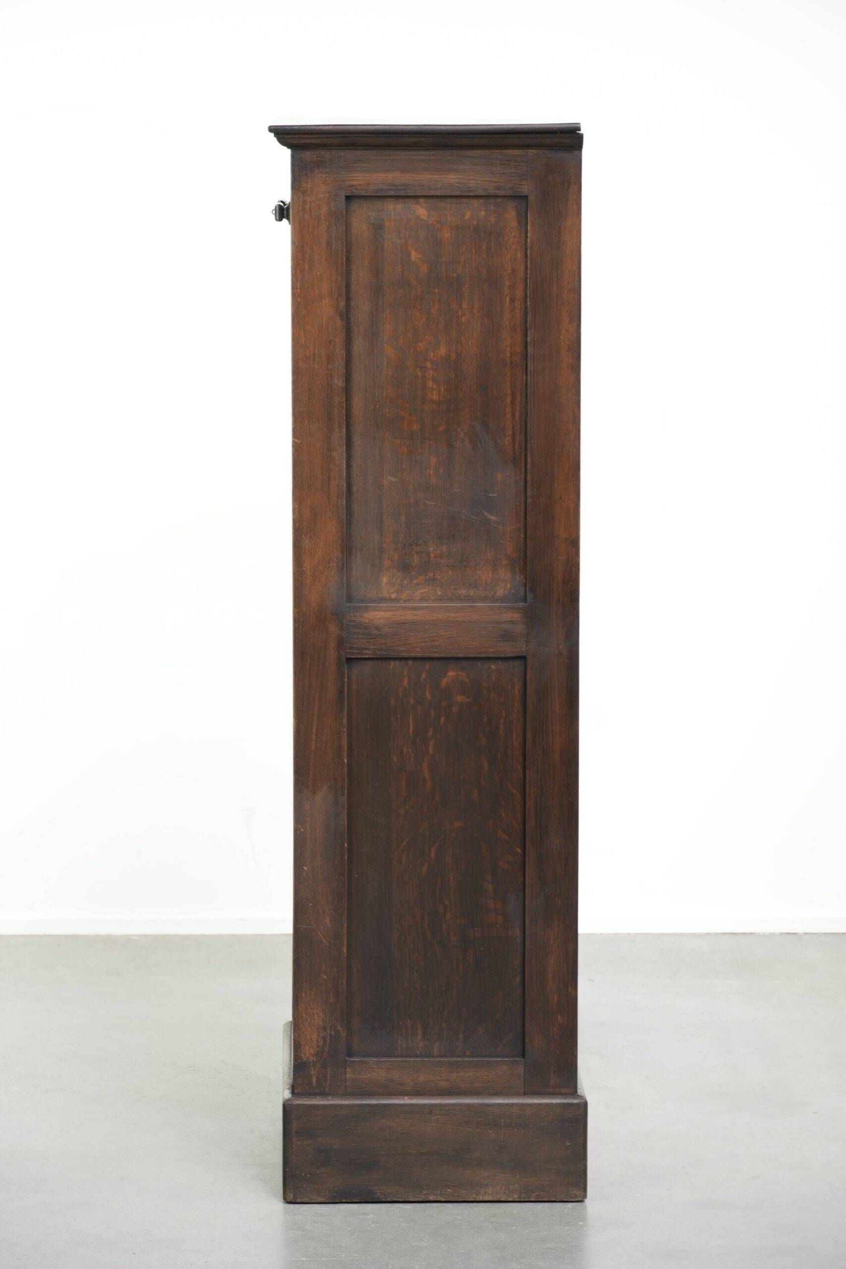 English antique archive cabinet with oak roll-up door from the 20th century