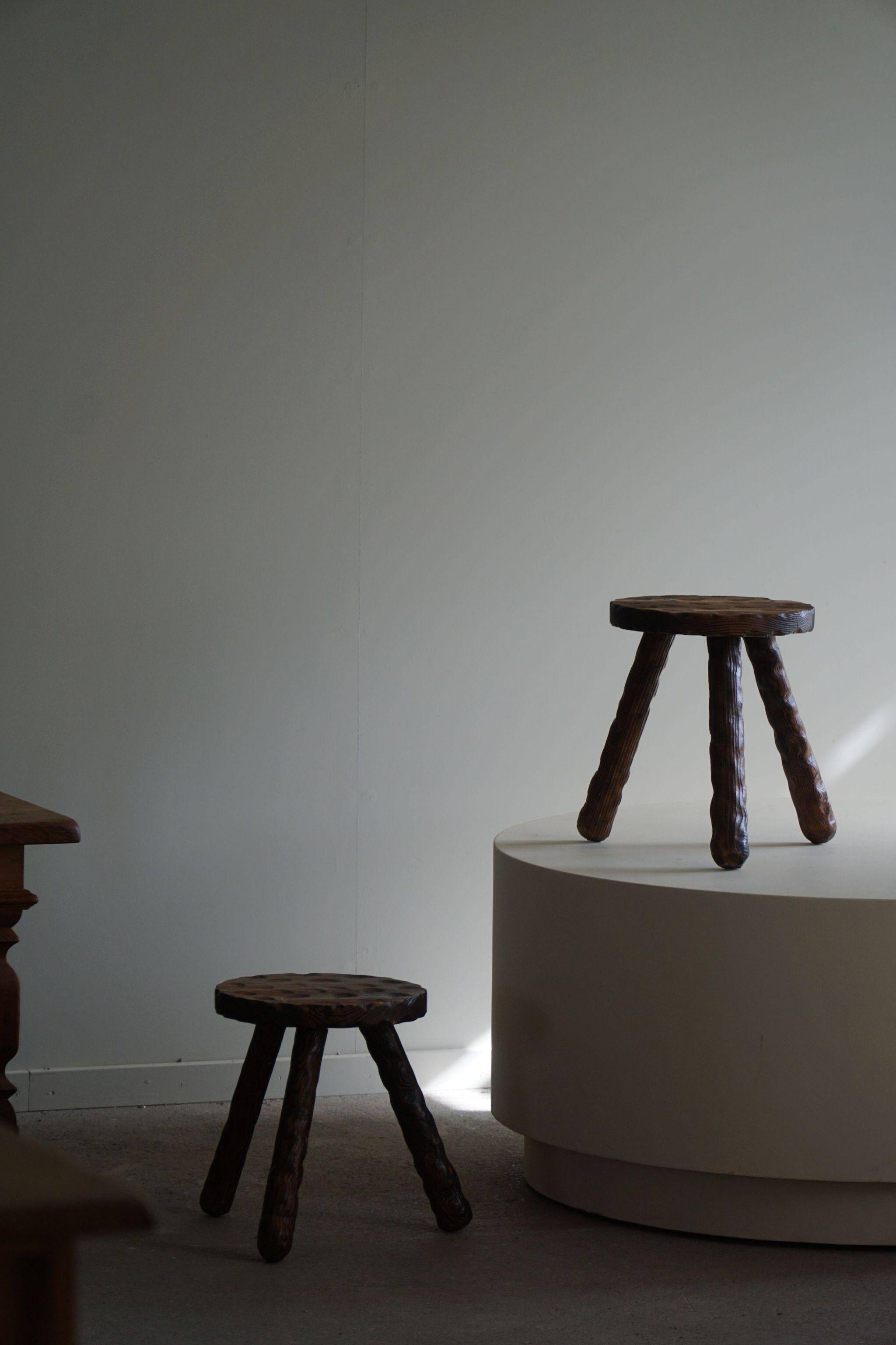 A pair of Wabi Sabi stools carved from pine, mid-century modern Swedish style, 1960s.
