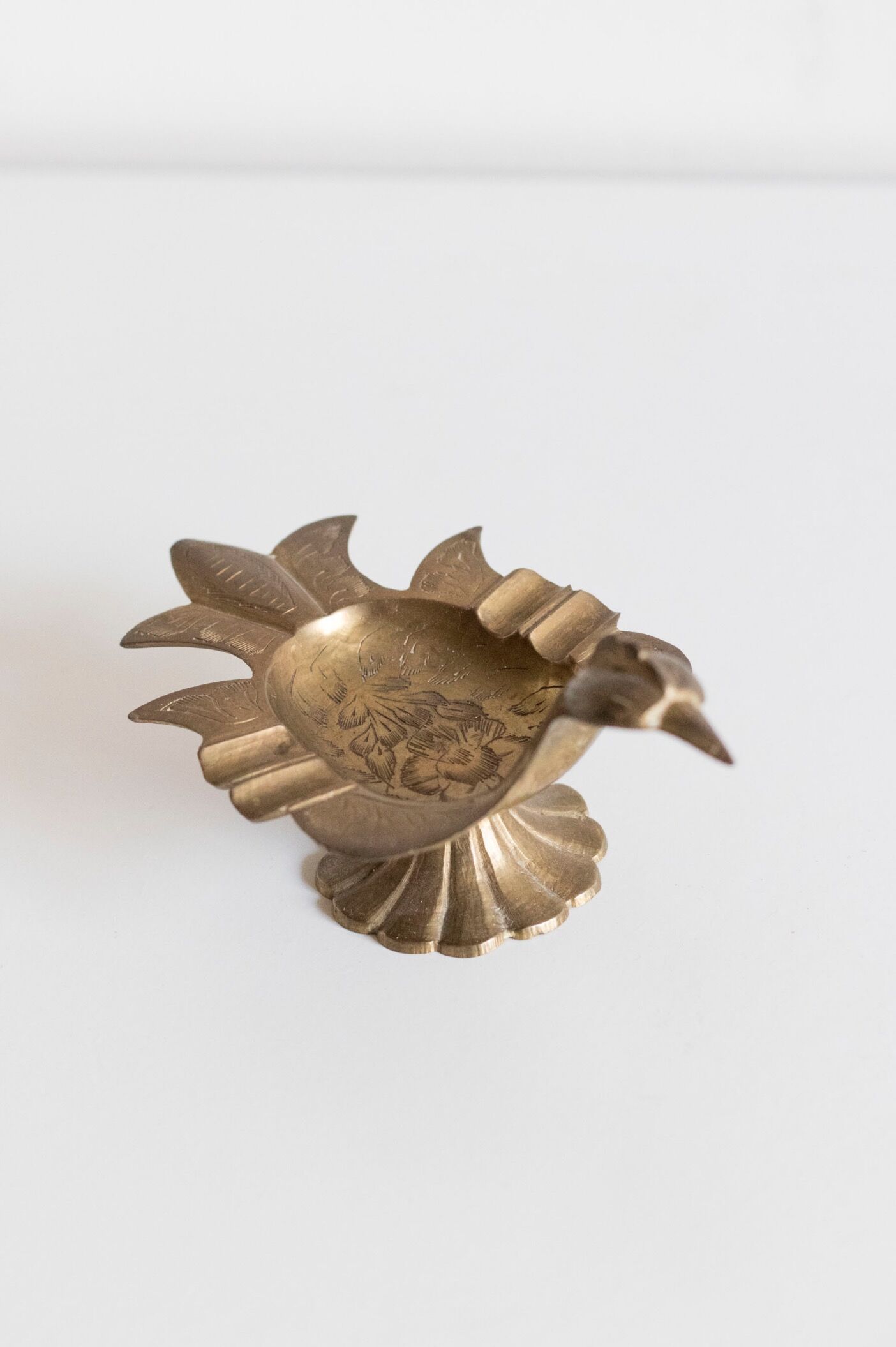 Empty pocket / old brass ashtray