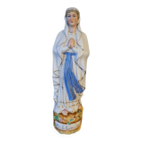 Religious statuette of the Virgin Mary in bisque porcelain