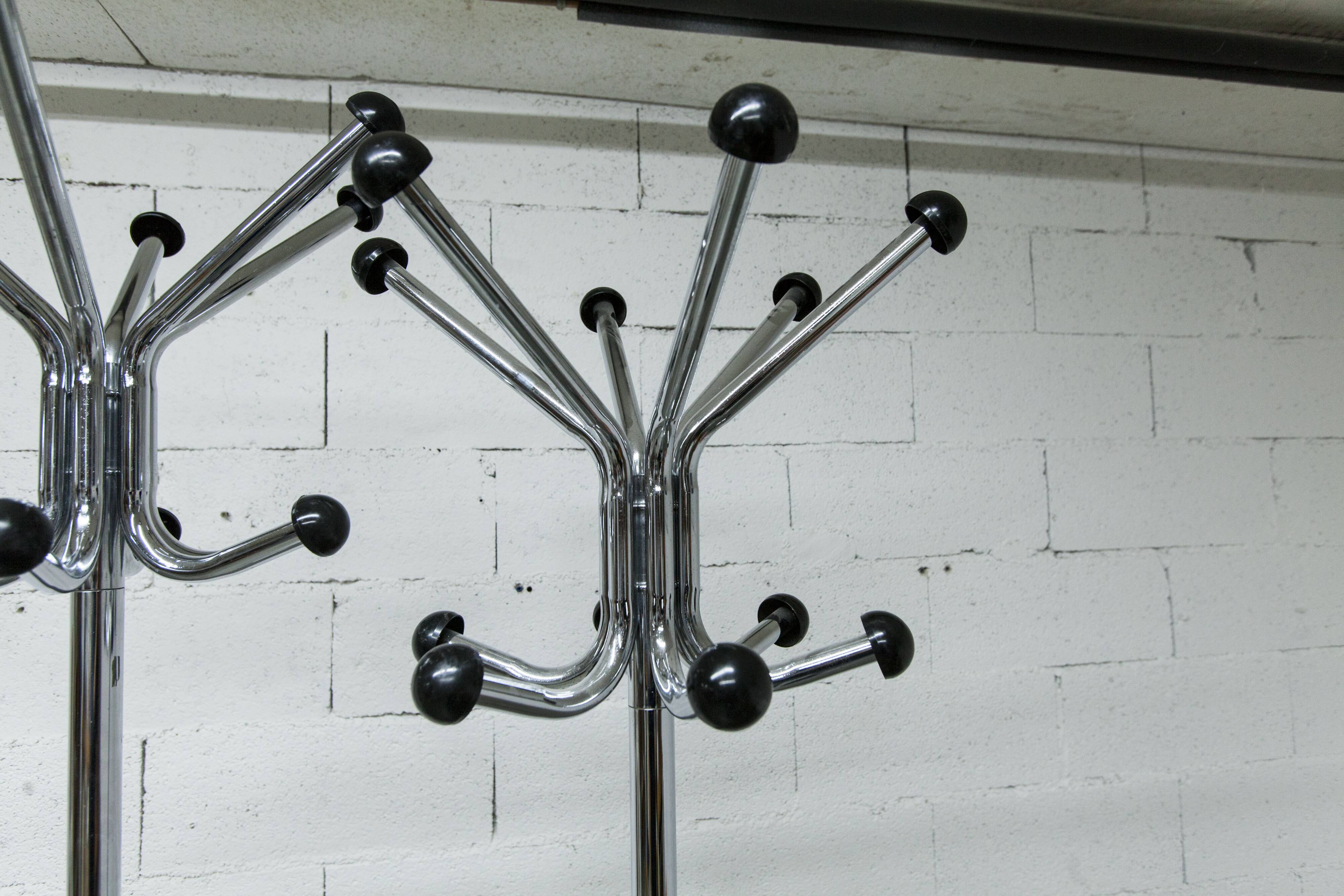 Coat rack with 12 chrome and black plastic hooks, 1960, 2m.