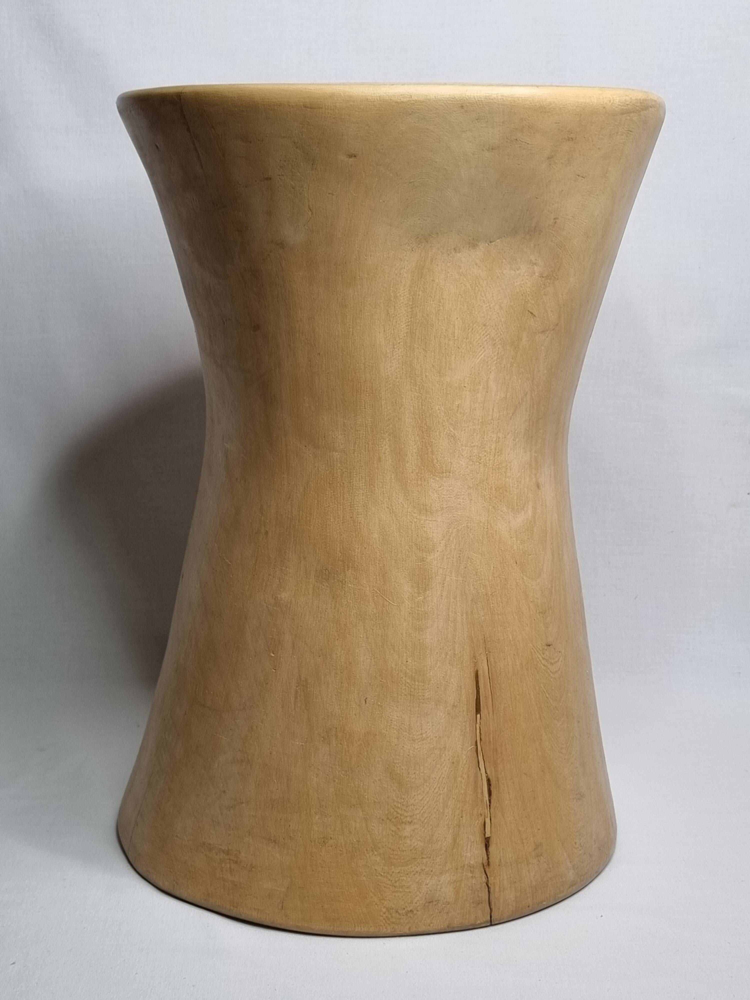 Brutalist monoxyle stool in solid mango wood, hourglass shape, 44 cm