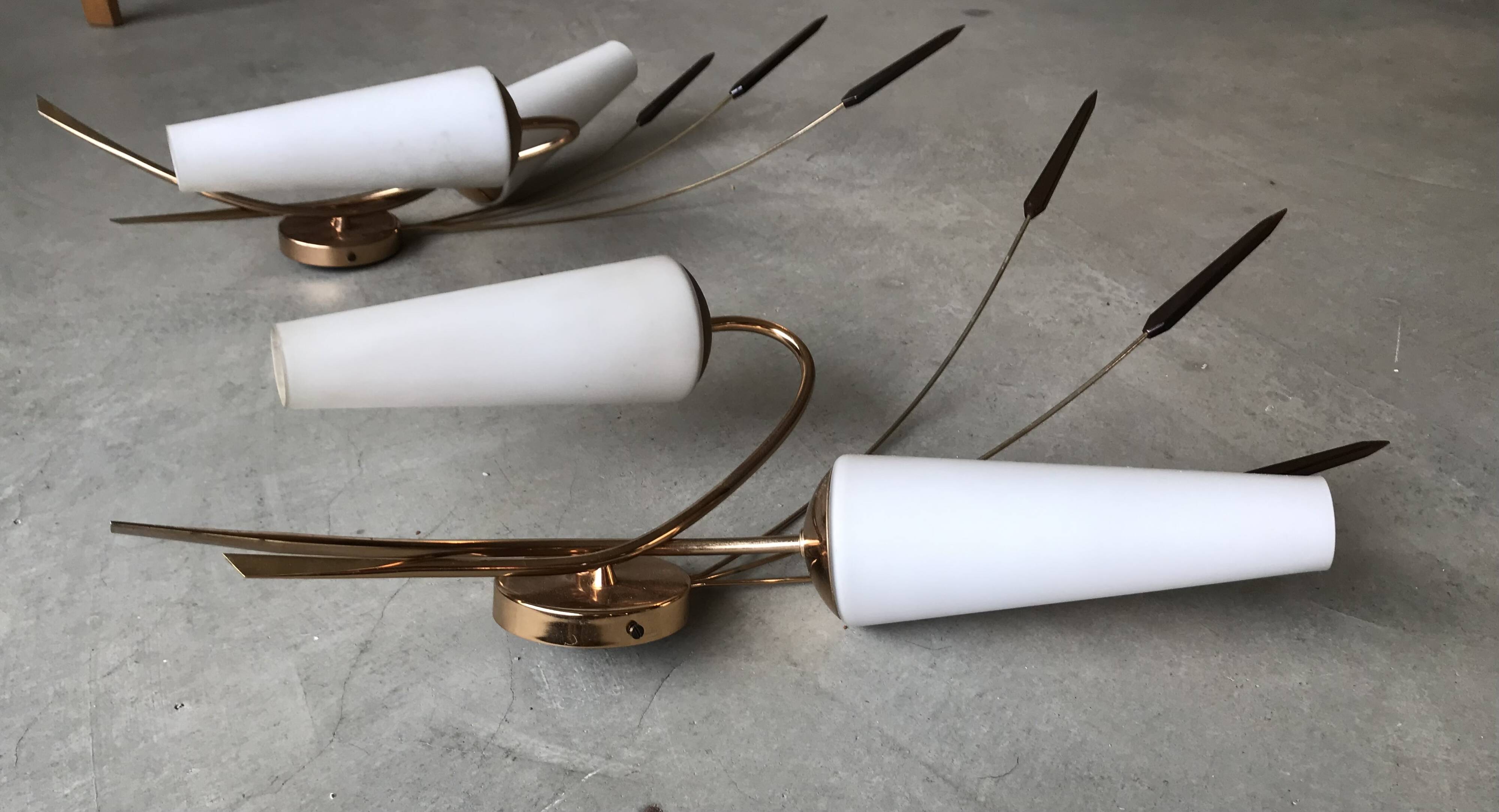 Pair of brass wall lights, circa 1950.