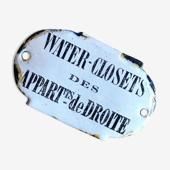 Plaque émaillée  "water-closets des appartements de droite". plaque d’immeuble parisien. vers 1910s