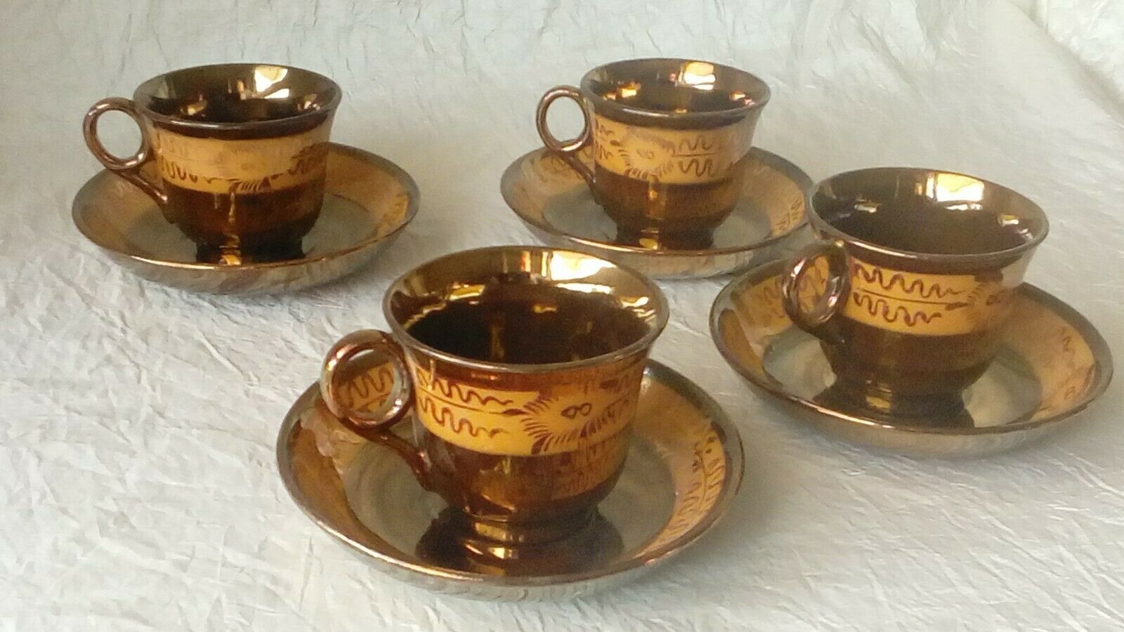 4 cups a cafe and under cups in faience of jersey