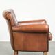 Timeless armchair made of sheepskin leather with a English look