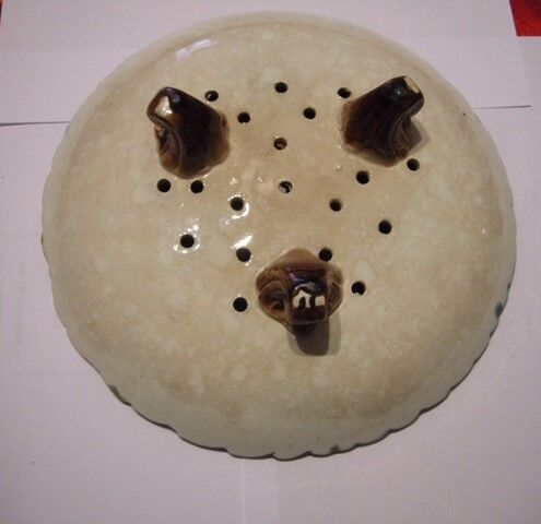 Barbotine decorating flat strawberry flowers