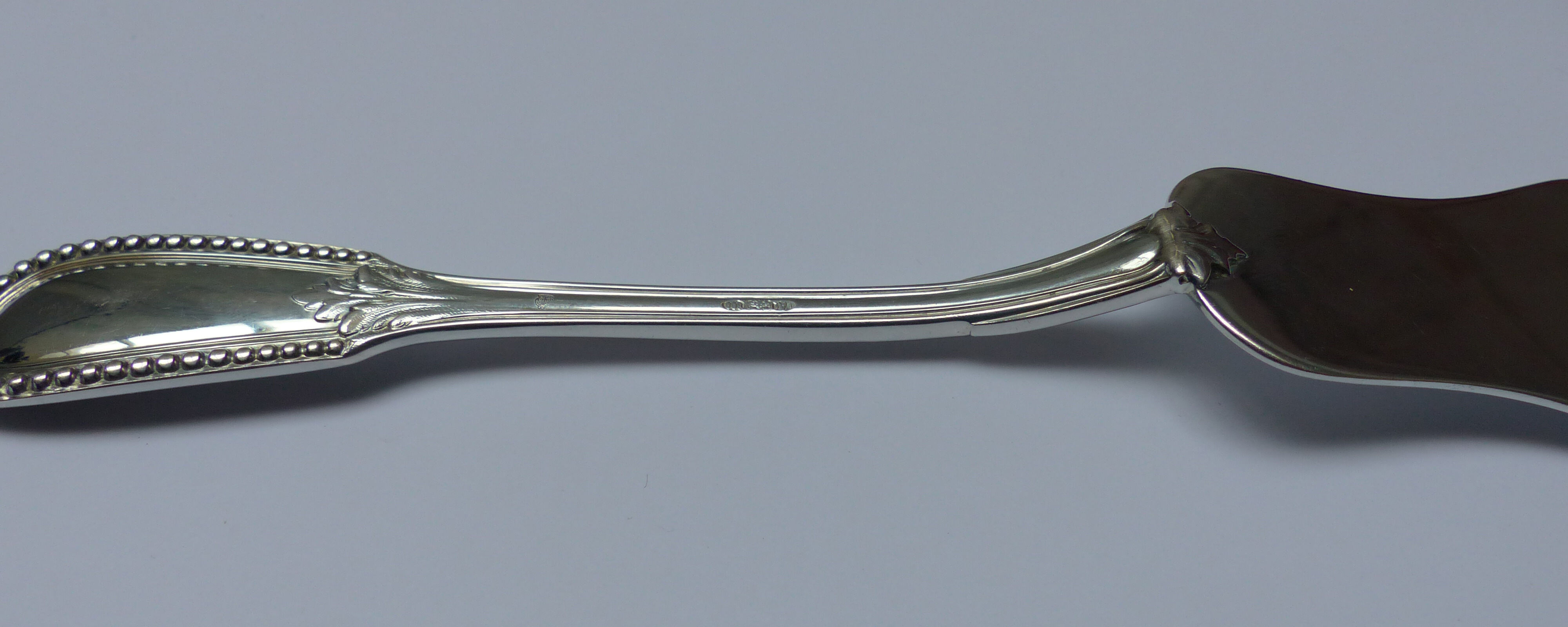 Antique silver mincing spoon