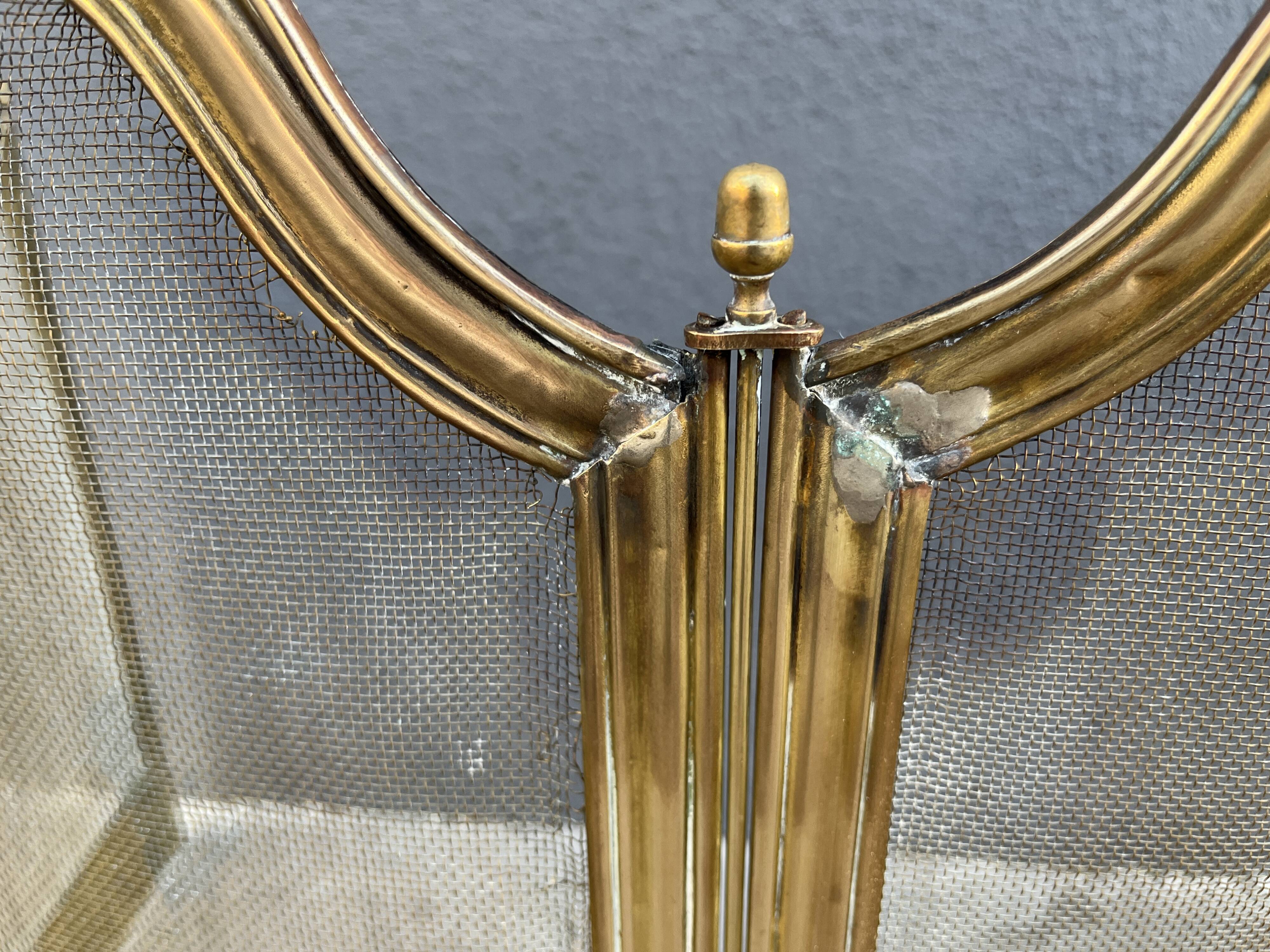 19th-century fireplace screen by Bouhon Frères in brass