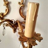 Rococo-style wall lamp in gilded bronze and crystal stamps