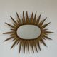 Vintage copper metal sun mirror oval shaped from the 1960s