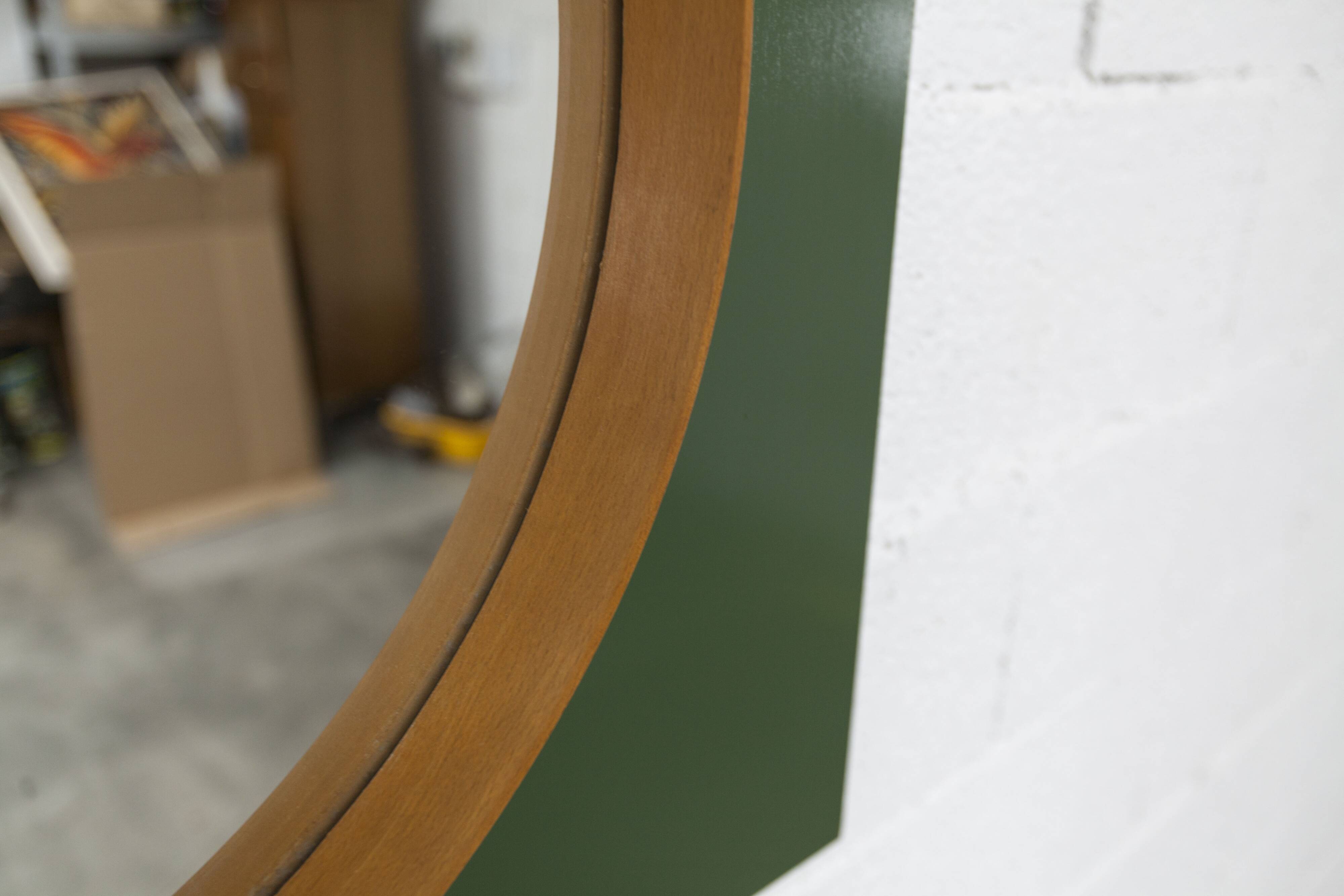 Unusual round wall mirror 60 cm teak edge on green rectangular board 1960.